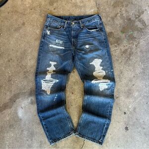 Vintage levi's distressed and patched medium wash grunge style jeans 31W 30L